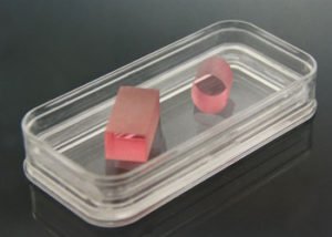 Titanium doped Sapphire (Ti:Sapphire) is the most widely used laser crystal for widely tunable and ultrashort pulsed lasers with high gain and high power outputs. The Ti:Sapphire crystals is grown by the method of Temperature Gradient Technique (TGT), the large-sized (Dia.30x 30mm) Ti:Sapphire crystal in high quality free of light scatter, with the dislocation density less than 102cm-2 could be provided. The TGT grown sapphire crystal is characterized by the (0001) oriented growth, high doping level (a490= 4.0cm-1), high gain and laser damage threshold.