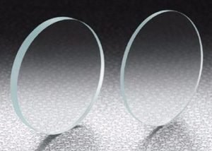 Sapphire Windows are manufactured from single crystal sapphire, making them ideal for demanding applications (such as laser systems) because of their extreme surface hardness, high thermal conductivity, high dielectric constant and resistance to common chemical acids and alkalis. Sapphire is the second hardest crystal next to diamonds and, because of their structural strength, sapphire windows can be made much thinner than other common dielectric windows with improved transmittance. Chemically, sapphire is single crystal aluminum oxide (Al2O3) and is useful in a transmission range from 0.2 – 5.5μm.